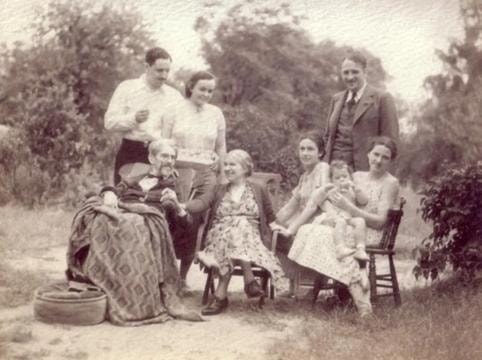 The Ahrens family gathered outdoors in Galt Ontario, June 1935, sepia photograph